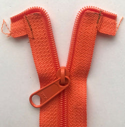Preparing a continuous zipper tape for the recessed zipper closure